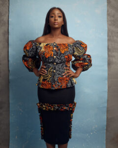 The NUTI Skirt and NUSE Top is a midi pencil skirt with wax print ruffle detail made by MOD Ghana for It's Made To Order